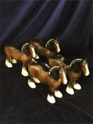 A selection of Four Beswick Shire Horse figures