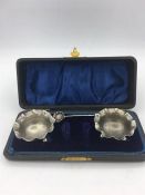 A cased pair of salts by William Aitken, hallmarked Birmingham 1904.