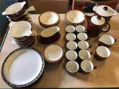 A Volume of Poole pottery brown coffee and dinner service pieces, to include 10 cups and saucers,