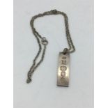 A hallmarked silver ingot necklace