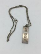 A hallmarked silver ingot necklace