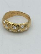 A Persian gold and diamond ring