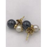 A pair of yellow metal cultured pearl earrings