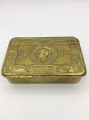 A Queen Mary Christmas tobacco tin