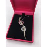 A 14ct white gold double heart shaped pendant necklace set with ruby, sapphire and citrines