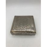 A hallmarked silver cigarette box