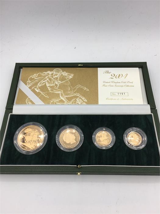 A 2004 gold proof coin set in 22ct, half sovereign, sovereign, double sovereign and five pound coin