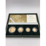 A 2004 gold proof coin set in 22ct, half sovereign, sovereign, double sovereign and five pound coin