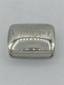 A Sterling silver pill box with 'Viagra' on the front.