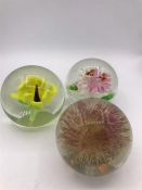 A Trio of paperweights