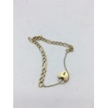 A 9ct gold bracelet with heart fastener (12.9g)