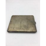 A silver cigarette case, hallmarked Birmingham 1938 and dedicated to Lieut JM Scott RAMC