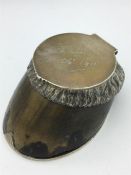 A silver mounted hoof, hallmarked, and engraved Zulu 1911.