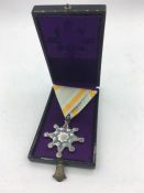 Japanese Cased, Order of the sacred treasure 8th class.