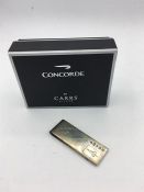 A hallmarked 'Concorde' silver money clip in original box