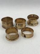 Five hallmarked silver napkin rings