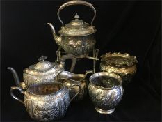A selection of silver plated items to include tea set