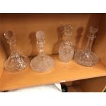 A selection of four glass decanters