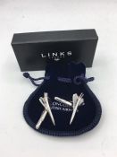 A pair of hallmarked silver 'Concorde' cuff links in original box