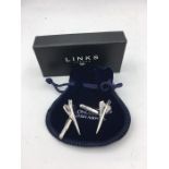 A pair of hallmarked silver 'Concorde' cuff links in original box