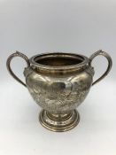 A silver sugar bowl