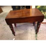A low mahogany commode style stool