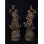 A Pair of Art Nouveau style statues in spelter.