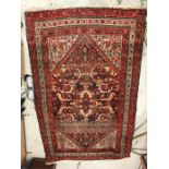 A red ground rug