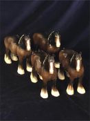 A selection of Four Beswick Shire Horse