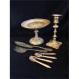 A selection of plated items to include cake stand, candlestick, fish servers and nut crackers.