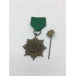 Ostvolk medal, bronze without swords, and lapel pin