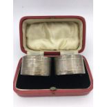A boxed set of silver napkin rings, hallmarked Sheffield 1939, makers mar CB& S