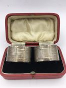 A boxed set of silver napkin rings, hallmarked Sheffield 1939, makers mar CB& S