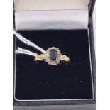 A 9ct gold Diamond and Sapphire ring