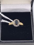 A 9ct gold Diamond and Sapphire ring