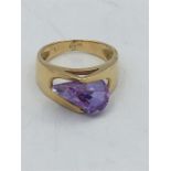 A Gold and Amethyst ring