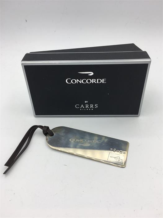 A silver hallmarked 'Concorde' luggage label in original box