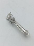 A silver posy brooch inset with a cat finial