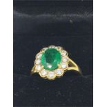 An 18ct yellow gold impressive Emerald and Diamond cluster ring 3.5ct's approx