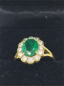 An 18ct yellow gold impressive Emerald and Diamond cluster ring 3.5ct's approx