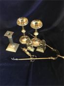 A box of sundry brass comprising a Pair of 8" candlestands; A pair of Peacock decorated bookends;