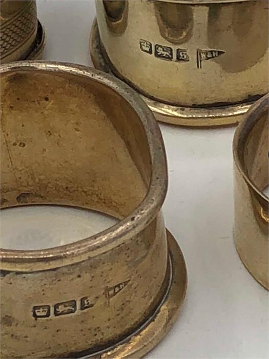 Five hallmarked silver napkin rings - Image 2 of 4