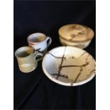 Assorted pottery to include casserole dish, mugs etc.