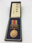 Japanese Cased China incident war medal 1939 with award document.