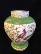 A vase with bird theme.