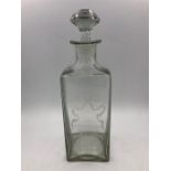 A square glass rum decanter