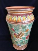 A stick stand or large vase