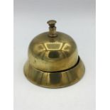 A Brass shop or counter bell.