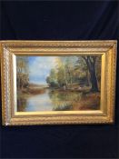 An oil painting of men by a lake by W J Graham 1926