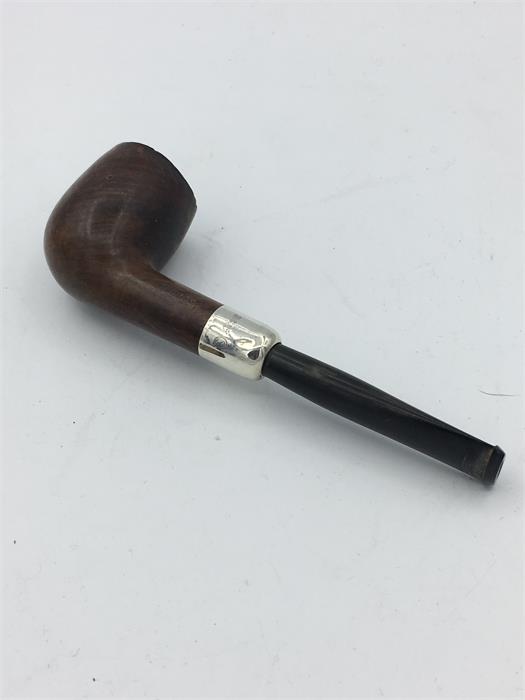 A gentleman's pipe with a silver mount